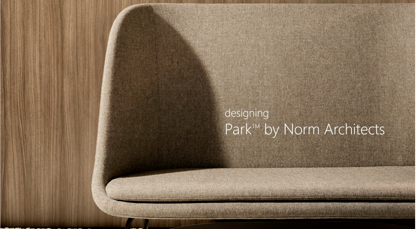 Park high-back seating against a wood-paneled wall